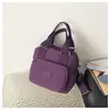 Bolso de mano Oxford de color liso, simple y elegante, superventas transfronterizo para mamás, bolso de mamá portátil, bolso de hombro multifuncional para mujeres
