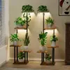 Prateleira de flores de ferro transfronteiriça para ambientes internos Sala de estar Suporte para vasos de flores multicamadas no chão Planta verde Varanda Suporte para flores Prateleira de armazenamento