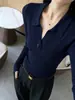 Suéter tejido de manga larga clásico estilo francés para mujer, nueva colección otoño/invierno 2026, corte ajustado, que estiliza la figura, con un sofisticado diseño de cuello en V y versátil para varios atuendos