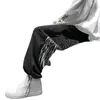 Calça de fleece forrada europeia e americana 2026, marca trendy de alta rua ins, com cordão, asa estilosa, jogger legal, calça esportiva casual para homens