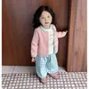 Conjunto coreano de tres piezas para niña 2026 primavera/otoño nuevo y elegante: suéter top y pantalones de cuadros