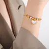 Estilo japonés y coreano fresco dulce personalidad todo partido nicho sentido del diseño no se desvanece mariposa amor Ojo pulsera pulsera