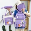 Mochila escolar para estudiantes de cuatro o cinco piezas, mochila para estudiante de primaria femenina, mochila de lona, mochila para niño, moderna, rábano, conejito