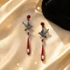 Pendientes de estilo punk oscuro gótico retro transfronterizos, pendientes de borla rojos dulces y geniales de chica hot, pendientes de la serie de Halloween