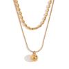 Moda europea y americana simple elegante popular collar acero inoxidable chapado en oro de 18K doble capa cuentas de arroz collar con colgante para mujer