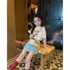 Conjunto Nuevo de Verano 2026 para Niñas: Conjunto de Dos Piezas: Camiseta de Manga Corta con Estampado de Cachorro Lindo + Falda Corta Azul con Graffiti