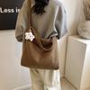 Bolso de mano de lana transfronterizo para mujer, otoño e invierno 2025, nuevo bolso de cubo de moda retro de moda, bolso cruzado informal de gran capacidad