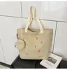 Bolsa de Lona de Grande Capacidade para Mulheres Verão e Outono 2025 Nova Bolsa Tote para o Dia a Dia para Mulheres Ins Estudantes Universitários Indo para a Aula Ombro Único