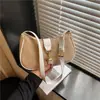 Bolso de hombro casual de comercio exterior moderno y elegante, diseño nuevo, moderno y único para la primavera de 2026, bolso de axila para mujer con textura tejida