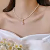 Collar de perlas de doble capa estilo retro francés para mujer, ligero, lujoso, de alta gama, con cadena para el cuello.