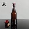 Verano en stock Hebilla marrón botella de cerveza 500ml resistente a la presión uso fábrica de cerveza fábrica de refrescos productos perennes de gran tamaño