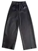 Los nuevos pantalones casuales negros de Sudu para mujer cuentan con costuras tridimensionales, un efecto adelgazante, bolsillos traseros de parche y un diseño holgado de pierna curva adecuado para ir al trabajo.