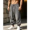 2026 outono e inverno transfronteiriço novo calça casual masculina de veludo cotelê europeia e americana, calça harém retrô de cor sólida solta no tornozelo
