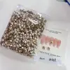 Pacote Completo de Acessórios para Nail Art de Fundo Pontiagudo Atacado, Strass Quadrados Brilhantes Grandes e Pequenos na Cor Champagne Formato de Ovo de Pombo para Decoração de Nail Art