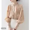 Camisa de manga larga con cuello alto de color albaricoque estilo francés para mujer, nueva colección primavera/otoño 2026, estilo retro de Hong Kong, adecuada para atuendo de trabajo