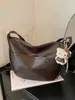 Comercio exterior popular este año Bolso cruzado estilo retro Maillard 2026 nuevo estilo moderno de moda versátil casual bolso tipo dumpling