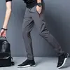 Calças Casuais Masculinas Verão 2026 Estilo Americano Tendência Versátil Reto Cor Sólida Slim Fit Esportivas Zíper Calças Stretch