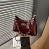 Bolsa transversal ombro único moda outono 2026 feminina popular corrente cera de abelha novo estilo axila versátil