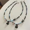 Collar de Cuentas Semilla Klein Blue Tendencia Nacional con Diseño Único y Colgante de Elefante Pequeño Choker