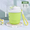 Nuevo vaso de agua color macarrón con asa portátil, vaso de vidrio, a prueba de fugas, alto valor estético, elegante vaso con pajilla
