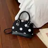Outono de 2026 novo elegante e simples estilo coreano feminino bolsa transversal de bolinhas bolsa concha atacado bolsas femininas
