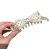 Puntos Blancos de EncajeEstilo delicado clip de plátano con lazo de lunares para coletas dobles, un hermoso clip de plátano