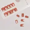 24 piezas de uñas cortas naranjas a presión con bordes dorados, parches para uñas de moda estilo ins transfronterizo