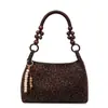 Bolsa de estampa de leopardo de nicho super popular para mulheres, nova bolsa de ombro e axila para o outono e inverno de 2026, bolsa transversal de camurça