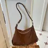 2026 Nueva Bolsa Retro Bajo el Brazo Nicho Gamuza Superficie Mate Bolso de Hombro Único Bolso Tote de Alta Gama para Viajes Diarios