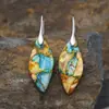 Nuevos pendientes colgantes de hojas de piedra natural bohemios europeos y americanos de moda, joyería retro de estación independiente transfronteriza.
