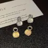 Libro rojo pequeño con pendientes de piedra ojo de gato moda lujo pendientes de diamante de mariposa 2024 nuevos pendientes una generación de pelo