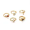 Anillo Geométrico Triangular de Zirconia Full Diamond Transfronterizo Europeo y Americano Anillo de Flor de Rosa Cruz Sol Anillo de Lujo Ligero para Mujer Venta al por Mayor