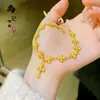 Tienda de Oro Mismo Estilo Arena Dorada Fortuna Gruesa Trébol de Cuatro Hojas Calabaza Ojo de Gato Pulsera para Mujer Moda Versátil Esmalte Cristal Pulsera