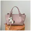 Bolsos Cruzados de Gama Alta de Nicho para Mujer 2026 Nuevo Bolso de Hombro Simple Versátil para el Trabajo Bolso de Mano Tipo Cubo de Moda