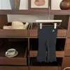 Ropa Infantil Coreana 2025 Nuevo Conjunto de Primavera y Otoño para Niñas Chaleco Infantil Camiseta Básica Pantalones Acampanados Conjunto de Tres Piezas Moderno