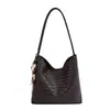 Bolsa Texturizada Retro Outono e Inverno Feminina 2026 Novo Estilo Design Texturizado Bolsa de Axila Moda Bolsa de Ombro Mão Mãe-Filho