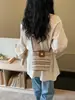 Bolsa Transversal de Tecido Listrada Arco-Íris Moda Tendência Verão 2026 com Design Único de Contraste de Cores Bolsa de Praia