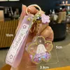 Liquidación de colección de llaveros colgantes de personajes de dibujos animados IP auténticos, lindos colgantes de estrella-luna-conejo para bolsos de niñas, stock para vendedores ambulantes
