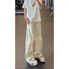 Jeans de hombre con dobladillo curvo bordado, nuevo estilo de verano, estilo americano, elegantes y de alta gama, diseño de nicho, pantalones ligeramente acampanados