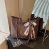 Bolsa Tote de Tecido de Nicho de Luxo para Mulheres 2026 Nova Bolsa de Ombro Único de Grande Capacidade para Trabalho e Deslocamento