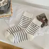 Nuevos Calcetines para Mujer 2025 Otoño e Invierno Rayados Bordados con Letras Algodón Sin Costuras de Media Pantorrilla Caídos Empaquetados Individualmente