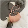2026 Versión Coreana Nuevo Estilo Piel Suave de PU Color Sólido Bolso Croissant Nicho de Moda Tendencia Personalizada Hombro Único Cruzado Bolso Dumpling