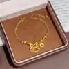 Nova pulseira de moedas de cavalo de madeira estilo chinês para mulheres, apresentando o signo do zodíaco do cavalo, com um toque de luxo leve e de alta qualidade, apresentando um acabamento fosco