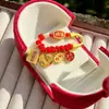 2025 Año del Serpiente en stock Cordón Dorado Rojo Pin Anti-Susto Seguridad para Bebés Broche para Mujeres Embarazadas Pin Creativo