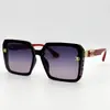 7731 moda irregular transfronteriza fabricantes de gafas de sol de PC lote directo de nicho flujo temperamento montura negra gafas de sol negras y grises