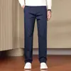 Pantalones casuales para hombre de fibra de bambú, color liso, resistentes a las arrugas, colección otoño 2026 nueva, pierna recta, corte ajustado, elásticos, versátiles, largos, venta al por mayor