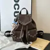 Mochila de Alta Gama Transfronteriza para Mujer 2026 Nueva Mochila de Remaches Retro de Nicho Mochila Casual con Cordón para Estudiante