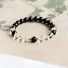 Pulsera de los Cinco Elementos Oro y Agua con Cuentas de Obsidiana Blanco Hielo Transparente Joyería Hidratante para Mujer para Personas con Deficiencia del Elemento Oro, Adecuada para Regalar