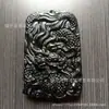 Ventas Directas de Fábrica Xinjiang Lantian jade oscuro natural colgante de jade de dragón colgante de jade tallado por ambos lados para hombres y mujeres Al por mayor