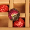 Té de primavera de material puro de árbol antiguo al por mayor Té Pu'er té Tuo de rosa té Tuo de rosa Pu'er caja bola de dragón hecha a mano